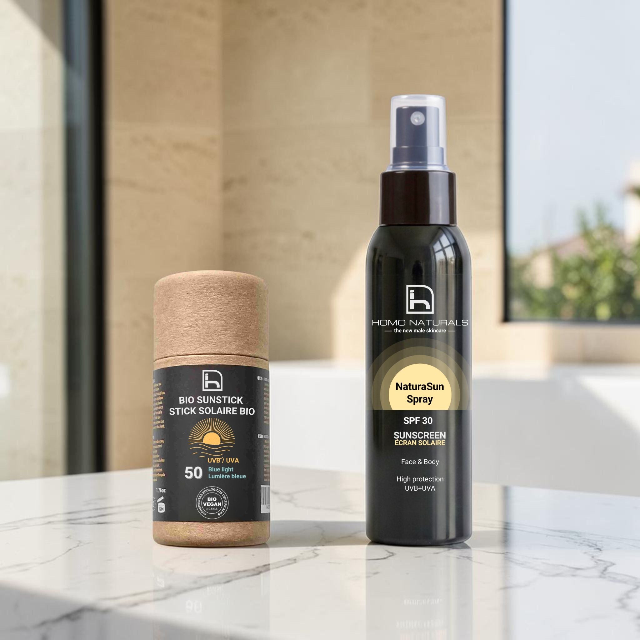 Imagen de los protectores solares naturales de Homo Naturals. Incluye el spray solar SPF30 ideal para cara y cuerpo, y el Sunstick SPF50 en stick biodegradable para rostro, labios y zonas localizadas.