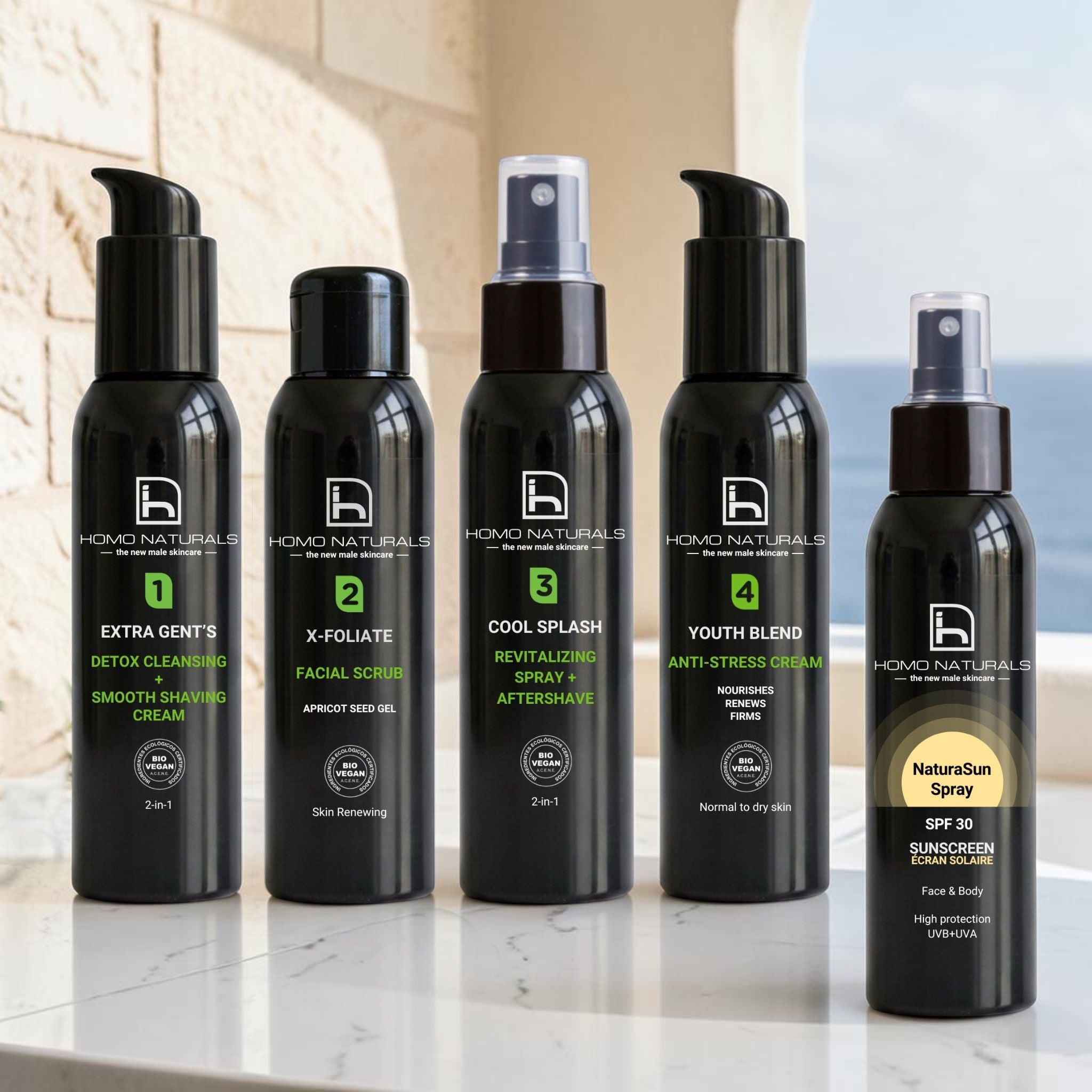 Imagen del tratamiento facial para hombre de Homo Naturals con protector solar. Incluye limpiador facial, exfoliante, tónico revitalizante y gel o crema antiedad según el tipo de piel. Incluye además un protector solar en spray. El objetivo es conseguir un rostro más cuidado, con piel más uniforme y rejuvenecida. 